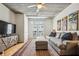 Comfortable living room featuring a couch, area rug and access to a balcony at 800 Peachtree Ne St # 2304, Atlanta, GA 30308