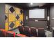 Private theater room with comfortable seating and a large projection screen at 800 Peachtree Ne St # 2304, Atlanta, GA 30308