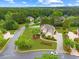 Aerial view showing the property's manicured landscaping, mature trees, and neighborhood location at 1364 Gulfport Run, Grayson, GA 30017