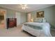 Bedroom with neutral walls, a large window, and lots of light, creating a calming atmosphere at 1364 Gulfport Run, Grayson, GA 30017