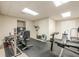 Well-equipped exercise room with various workout machines and a dedicated training space at 1364 Gulfport Run, Grayson, GA 30017