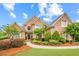 Stunning two-story brick home with manicured landscaping and inviting curb appeal at 1364 Gulfport Run, Grayson, GA 30017