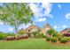 Beautiful front exterior features brick facade, lush lawn, and well-maintained landscaping for great curb appeal at 1364 Gulfport Run, Grayson, GA 30017