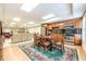 A basement kitchen featuring cabinets, stainless steel appliances, and a table for dining at 1364 Gulfport Run, Grayson, GA 30017