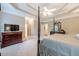 Main bedroom features a four-poster bed, trey ceilings, and a spacious layout at 1364 Gulfport Run, Grayson, GA 30017