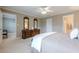 This main bedroom boasts mirrors, furniture, and entryways to other parts of the house at 1364 Gulfport Run, Grayson, GA 30017