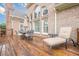 Relaxing outdoor patio with dining set and lounge chair, perfect for enjoying sunny afternoons at 1364 Gulfport Run, Grayson, GA 30017