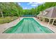Large community swimming pool with tennis courts in the background at 1364 Gulfport Run, Grayson, GA 30017