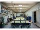 Interior shot of large garage with high ceilings, work benches, tool boxes, and signage at 1369 N Highway 16, Whitesburg, GA 30185