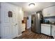 Spacious kitchen featuring stainless steel appliances, custom cabinets and pantry at 1369 N Highway 16, Whitesburg, GA 30185