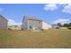 Large backyard offers plenty of room for outdoor activities and potential landscaping projects at 231 Limestone Cir, Conyers, GA 30013