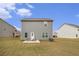 Backyard with a patio and seating providing space for outdoor living and entertaining at 231 Limestone Cir, Conyers, GA 30013