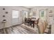 Cozy dining area with a view of the backyard, perfect for Gathering meals and gatherings at 231 Limestone Cir, Conyers, GA 30013