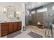 Elegant bathroom featuring a glass shower, freestanding tub, and modern vanity with ample storage at 260 Jasmine Garden Way, Alpharetta, GA 30009