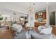 Open living space with hardwood floors, comfortable seating, and built-in cabinets at 260 Jasmine Garden Way, Alpharetta, GA 30009
