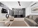 Stylish living room featuring comfortable seating, modern amenities, and a sleek kitchenette for entertaining at 511 Sycamore St, Decatur, GA 30030