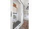 Mudroom with a built-in bench, custom cabinetry, and decorative artwork adding a cozy and organized touch at 511 Sycamore St, Decatur, GA 30030
