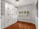 This closet has an abundance of storage with built in shelving, drawers, and closed cabinets at 201 Hunley Ct, Alpharetta, GA 30005