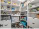 Organized pantry with ample shelving and storage space for food and household items at 201 Hunley Ct, Alpharetta, GA 30005