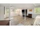 Finished basement features neutral decor, a finished ceiling, exposed support beams, and outside view at 4111 Mcclatchey Ne Cir, Atlanta, GA 30342