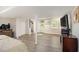 Finished basement features neutral decor, a finished ceiling, exposed support beams, and outside view at 4111 Mcclatchey Ne Cir, Atlanta, GA 30342