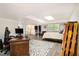 Finished basement features neutral decor, a finished ceiling, exposed support beams, and outside view at 4111 Mcclatchey Ne Cir, Atlanta, GA 30342