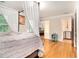 Bedroom with canopy bed and hardwood floors at 4111 Mcclatchey Ne Cir, Atlanta, GA 30342