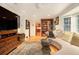 Living room with bay window and built in bookshelf at 4111 Mcclatchey Ne Cir, Atlanta, GA 30342