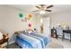Comfortable bedroom with a desk, chair, and colorful decorations, perfect for a or teen at 461 Silver St, Buford, GA 30518