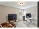 Spacious office with multiple monitors, comfortable seating, and a peaceful workspace at 461 Silver St, Buford, GA 30518