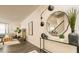 Stylish entryway with modern decor, a mirror, and view of stairs leading up to the second floor at 4946 Jatoba Rd, Acworth, GA 30101