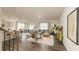 Open living space with a kitchen, bar seating, dining area, and a cozy living room at 4946 Jatoba Rd, Acworth, GA 30101