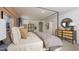 Serene main bedroom with a canopy bed, contemporary decor, and natural light at 4946 Jatoba Rd, Acworth, GA 30101