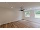 Bedroom featuring light wood flooring, recessed lighting, and a ceiling fan at 525 Rosemont Dr, Decatur, GA 30032