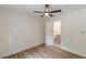 Bedroom with ceiling fan, wood-look floors and bathroom access at 525 Rosemont Dr, Decatur, GA 30032