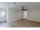 Bright bedroom showcasing light wood floors, recessed lighting, and white trim at 525 Rosemont Dr, Decatur, GA 30032