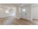 Inviting entryway with neutral walls, wood-look flooring, and a stylish front door welcomes guests into this well-lit home at 525 Rosemont Dr, Decatur, GA 30032