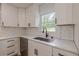 Kitchen sink has subway tile backsplash with views of nature at 525 Rosemont Dr, Decatur, GA 30032