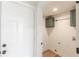 Cozy laundry area featuring washer hookups and overhead storage at 525 Rosemont Dr, Decatur, GA 30032