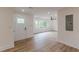 Cozy living room featuring natural light, wood-look flooring, and ceiling fan creates comfortable and inviting space at 525 Rosemont Dr, Decatur, GA 30032