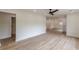 Open living room features wood floors, recessed lights, and neutral colors at 525 Rosemont Dr, Decatur, GA 30032