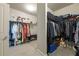 Large walk-in closet with ample storage space, racks, and shelving at 590 Birkdale Dr, Fairburn, GA 30213