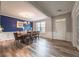 Open dining room concept features stylish decor, hardwood floors, and abundant natural light at 590 Birkdale Dr, Fairburn, GA 30213