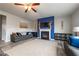 Cozy living room features a fireplace with blue accent wall, offering a perfect relaxation space at 590 Birkdale Dr, Fairburn, GA 30213