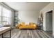 Charming living room boasts a unique style with natural light and neutral paint at 590 Birkdale Dr, Fairburn, GA 30213