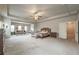 Spacious main bedroom boasts a tray ceiling and large sitting area at 590 Birkdale Dr, Fairburn, GA 30213