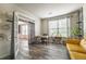 Bright home office featuring wood floors, large windows, and stylish decor at 590 Birkdale Dr, Fairburn, GA 30213