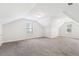 Neutral bonus room with carpeted floors, natural lighting, and angled ceilings at 6230 Lillie Lane, Cumming, GA 30040
