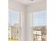 Sunlight streams through the window, brightening this cheerful and airy room at 1109 Blue Juniper Cir, Loganville, GA 30052