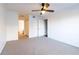 Spacious bedroom with neutral carpet, ceiling fan, and ensuite bathroom access at 2657 Lenox Ne Rd # 68 Bld, Atlanta, GA 30324
